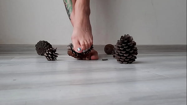 Mistress makes herself a self-massage of the feet with bumps. Foot fetish. Sexy toes